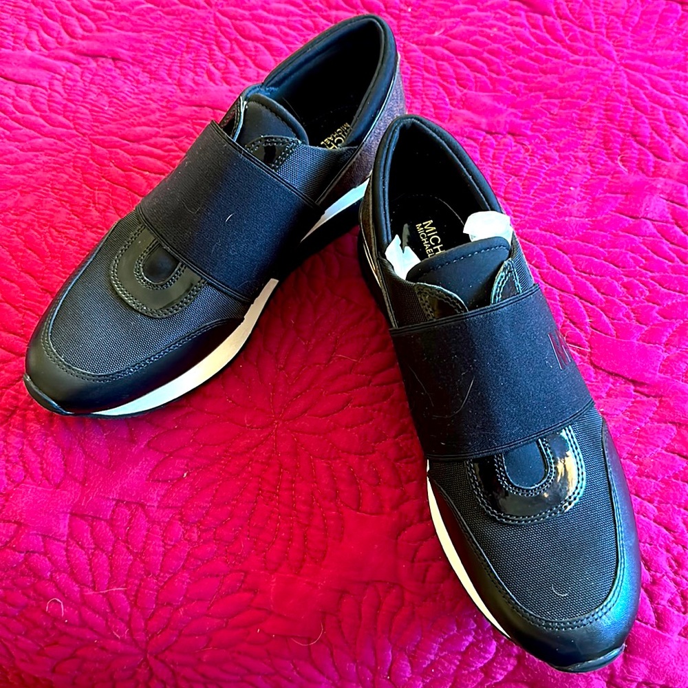 Michael Kors sneakers never worn, brown and black in great condition